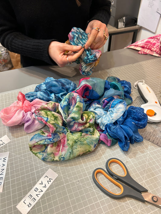 Silk scarfs being upcycled to scrunchies